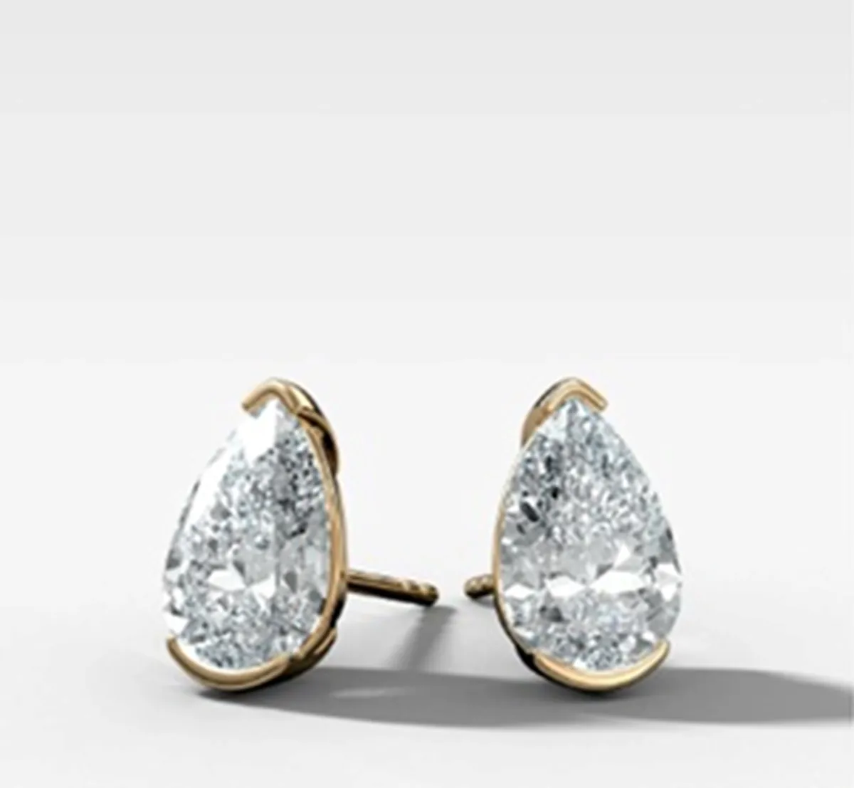 Half Bezel Setting Pear Diamond Solitaire Earring 