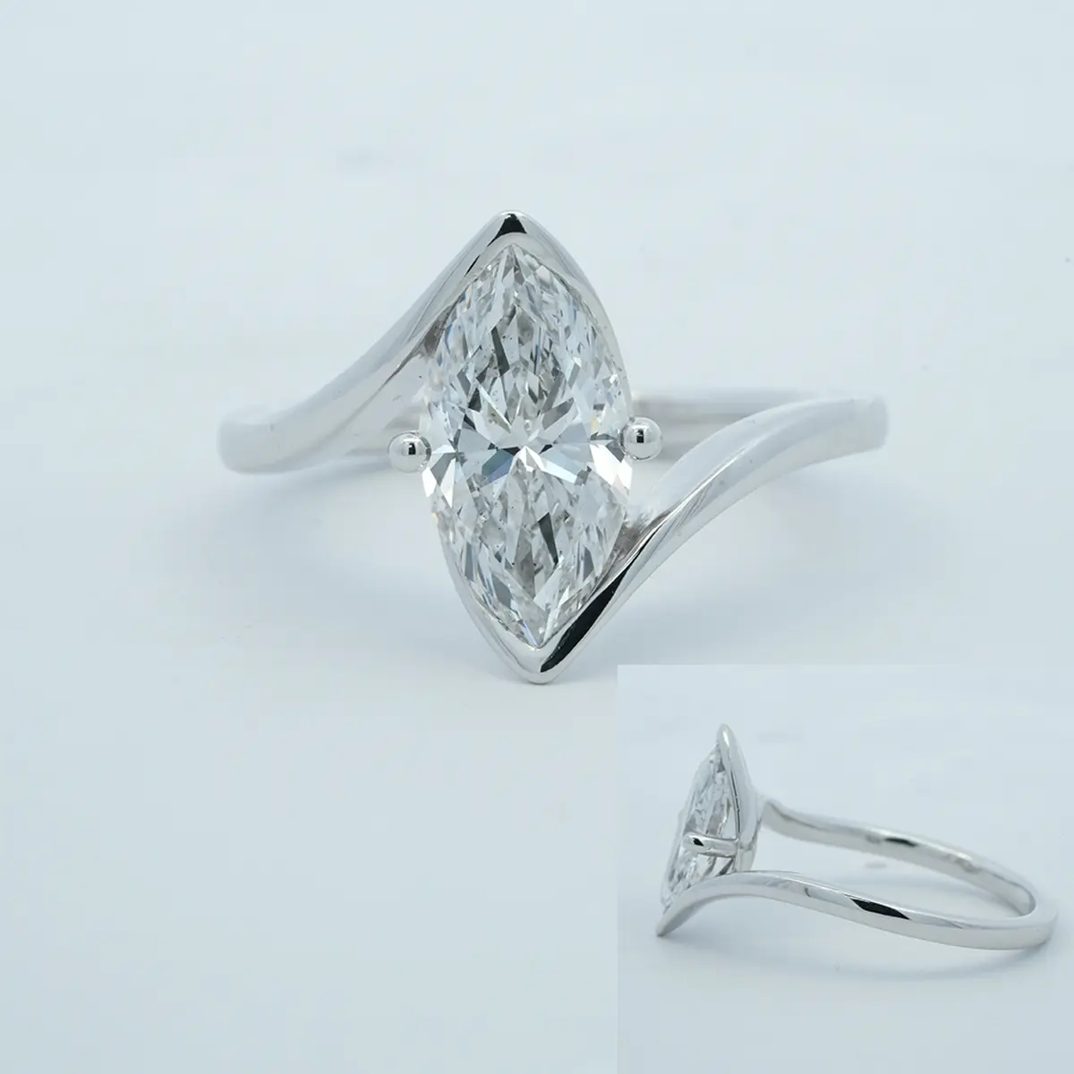 Half Bezel Marquise Diamond Solitaire Ring 