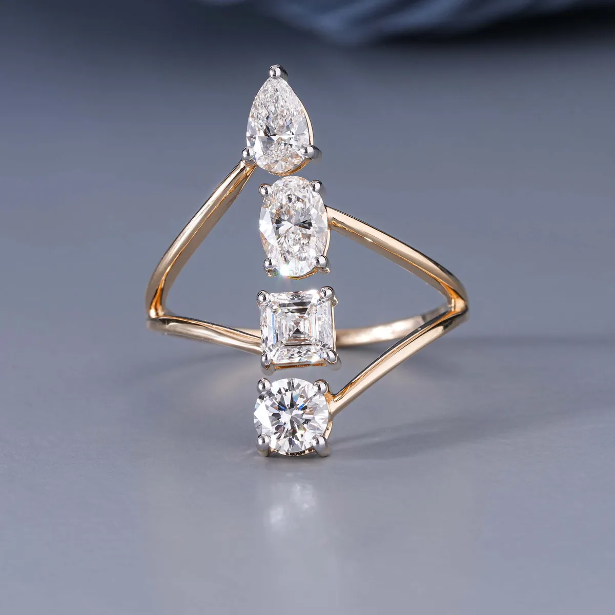 Emerald, Oval, Pear & Round Diamond Fashion Ring 