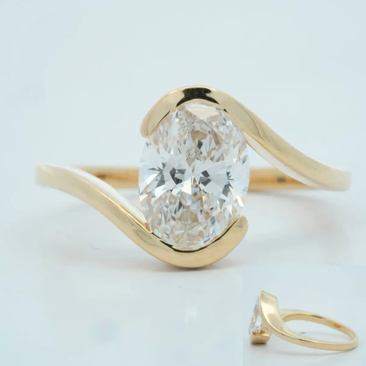 Half Bezel Setting Oval Diamond Solitaire Ring 