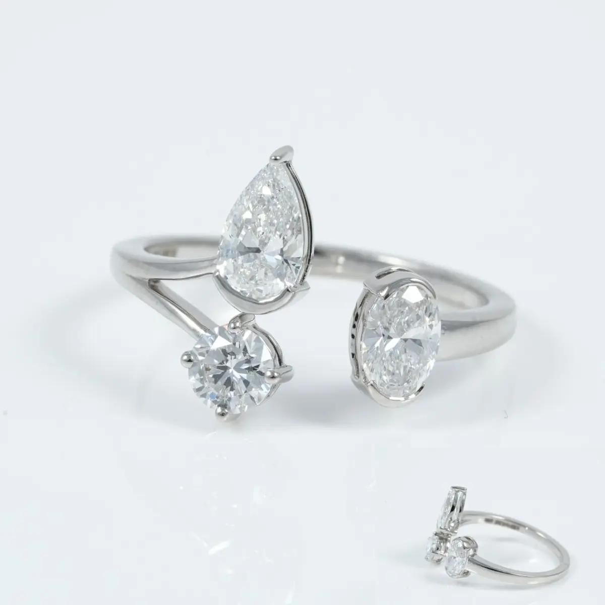 Half Bezel Setting Oval, Pear & Round Diamond Fashion Ring 